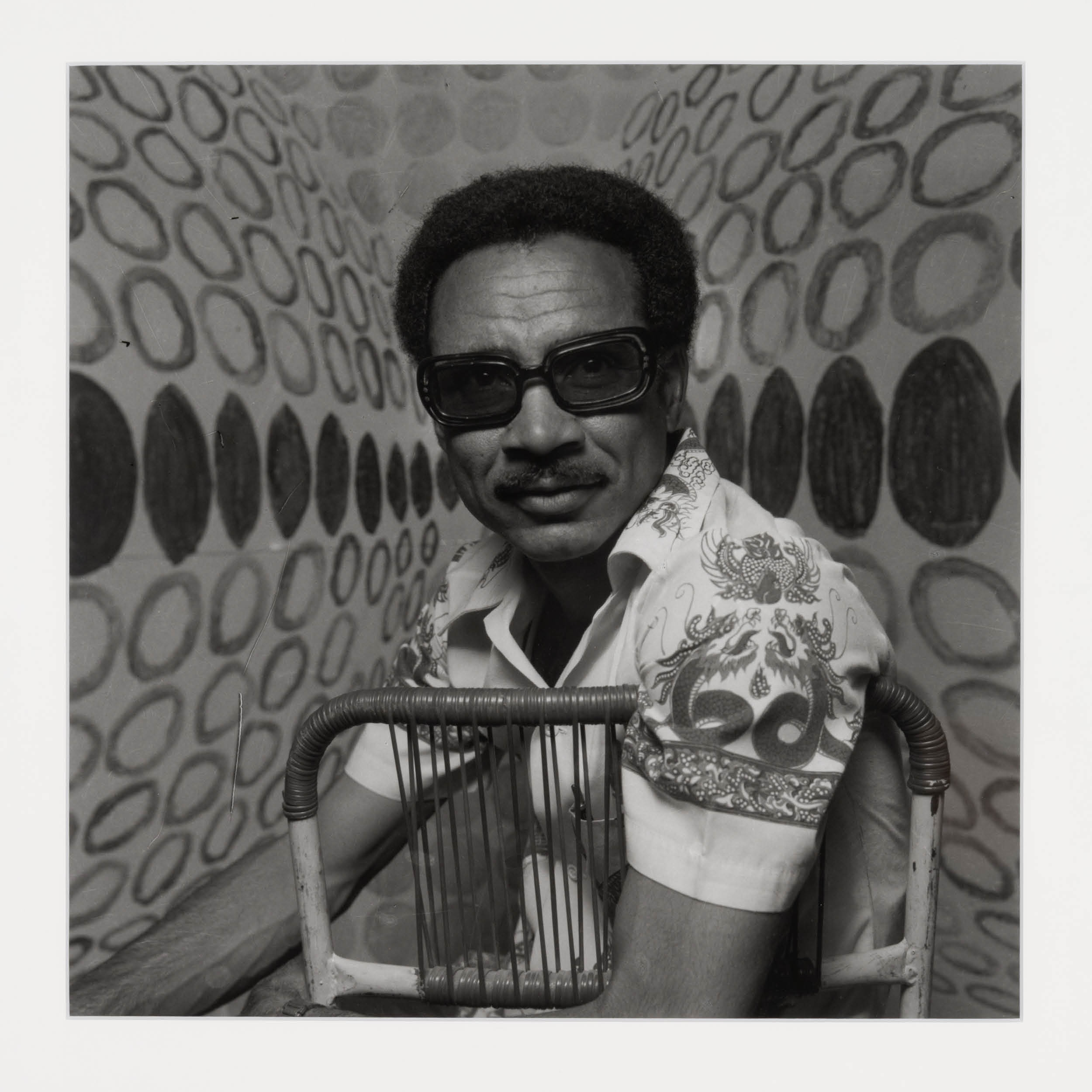 Self portrait with self painted background/ Khartoum